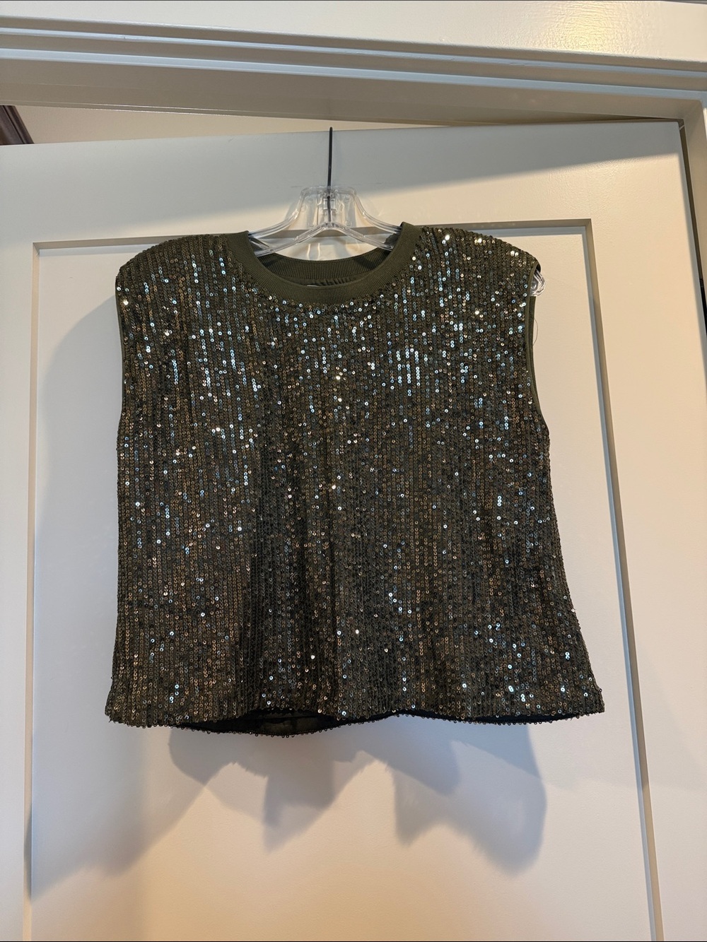 New with tags. Skies are blue olive sequin muscle top